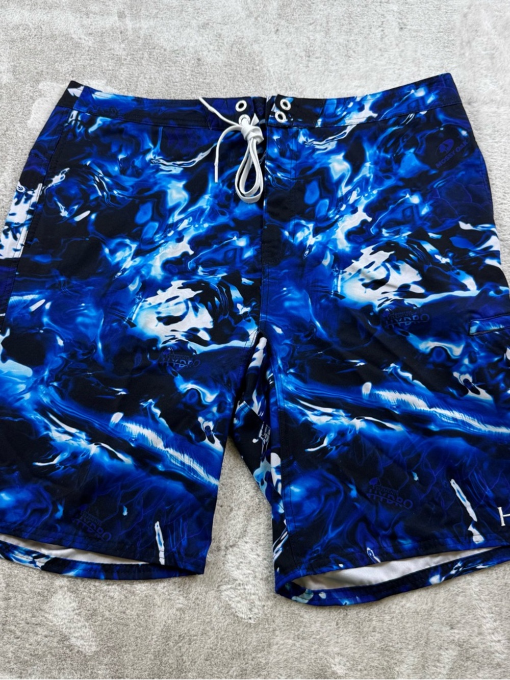 Huk performance fishing board shorts men’s size 38 blue mossy Oak hydro elements